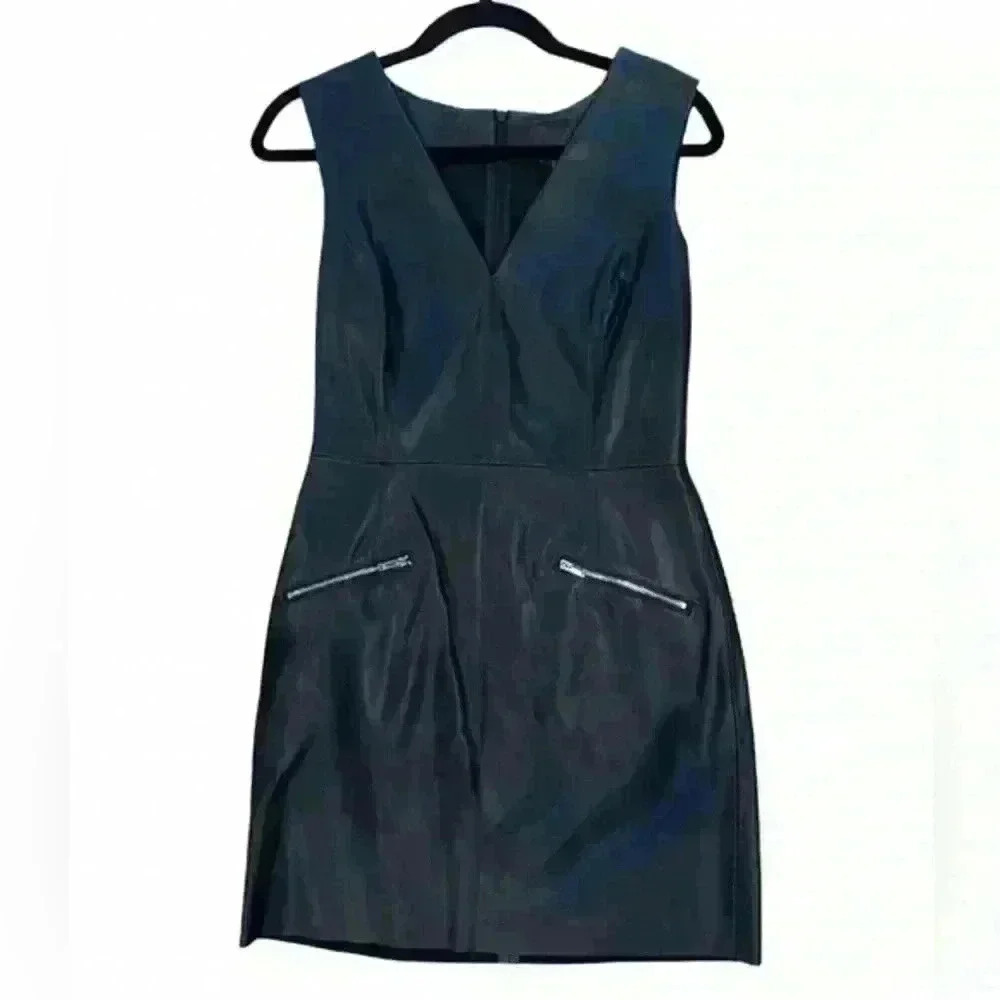 Black Faux Leather dress with two front zipper pockets.